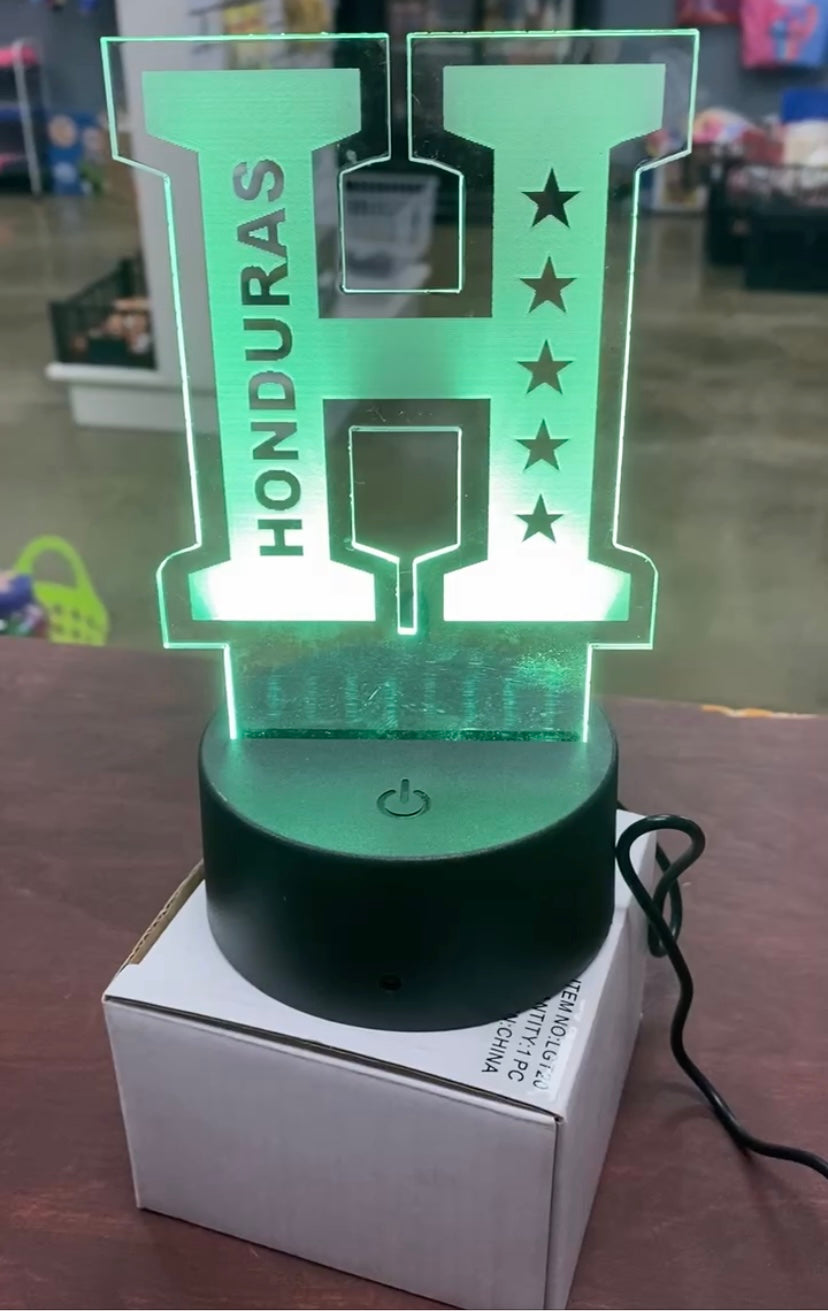 Adorno de honduras,con luces de colores,trae su cargador y control